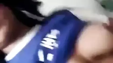 Beautiful desi girl lifting top to reveal sexy boobs